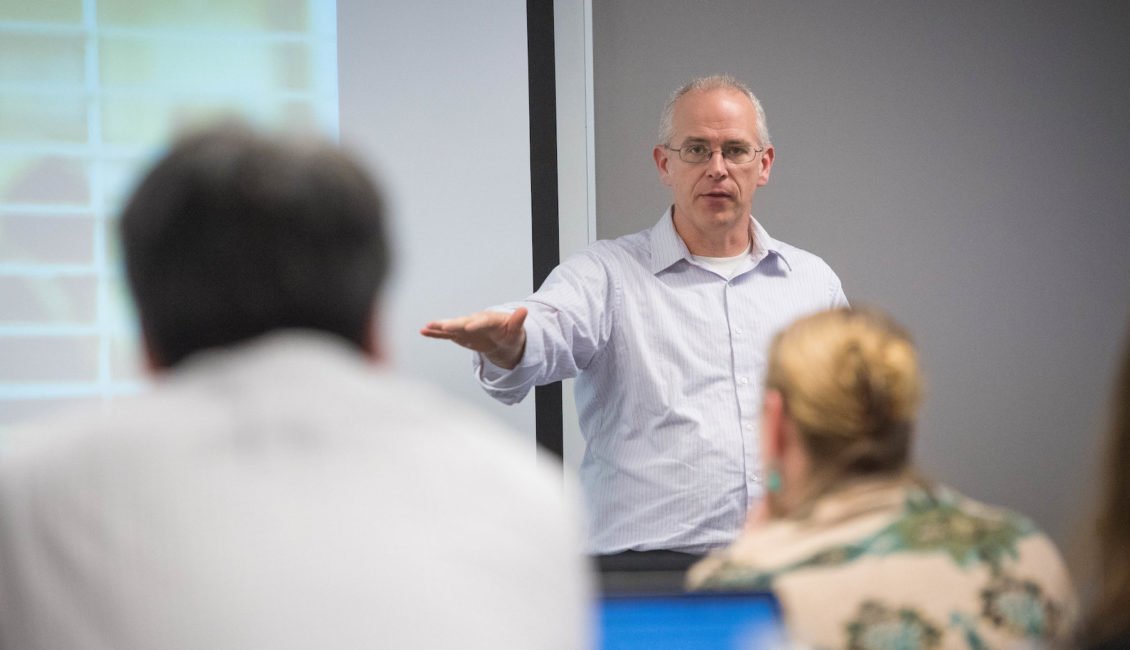 Faculty instructing a class